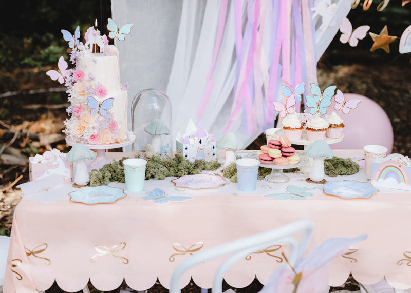 Pink tablecloth with golden bows