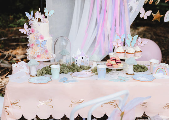 Pink tablecloth with golden bows