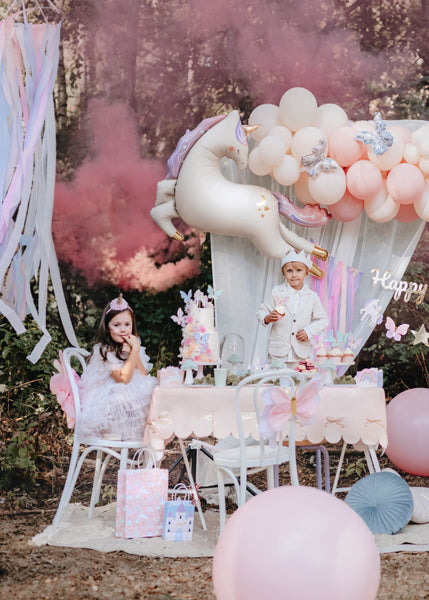 Pink tablecloth with golden bows